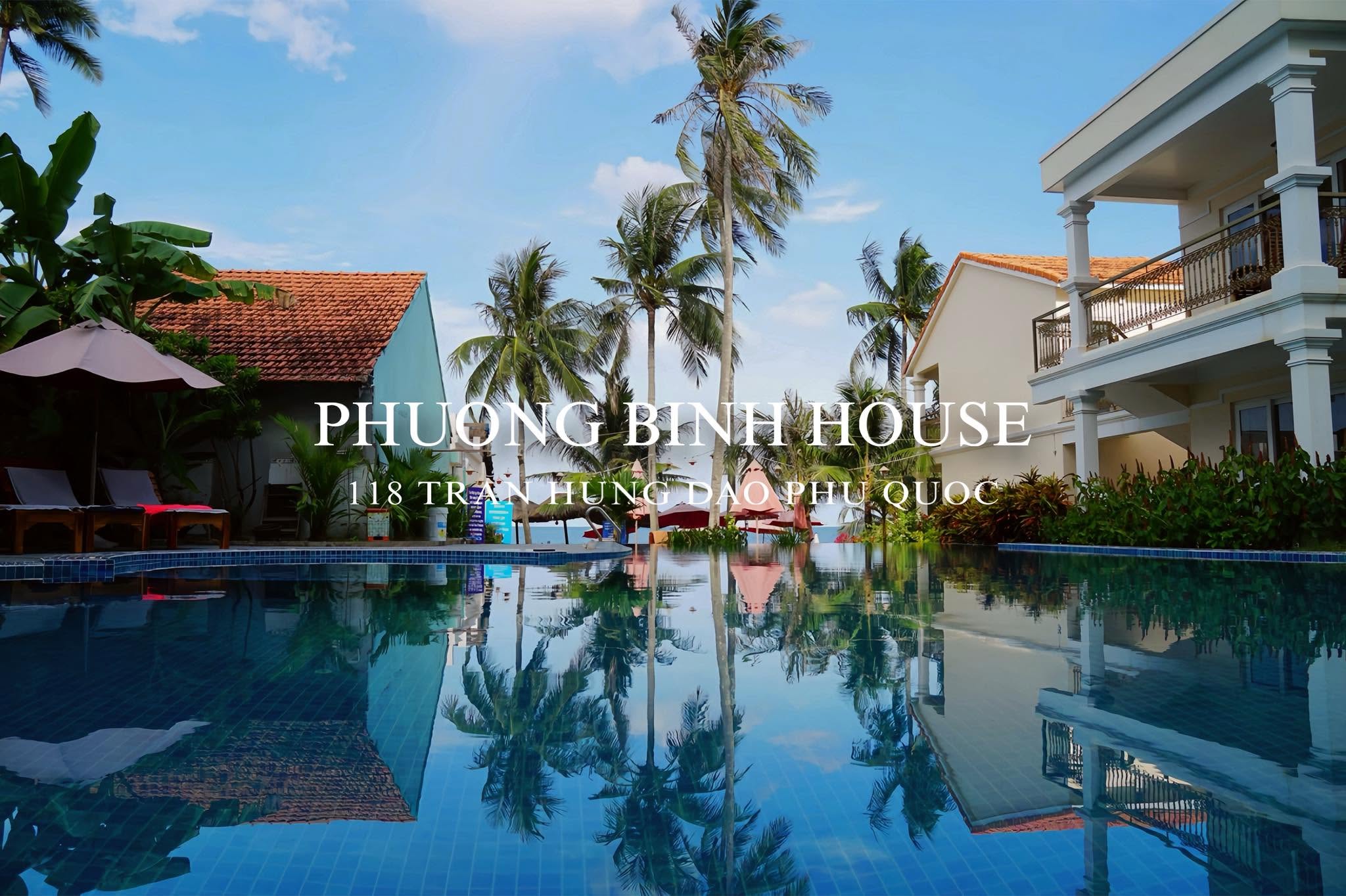 PhuongBinh House at golden hour, palms framing a calm beach